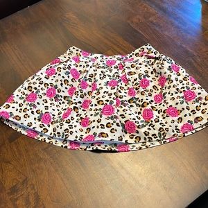 Forever 21 girls cheetah and rose printed skirt.